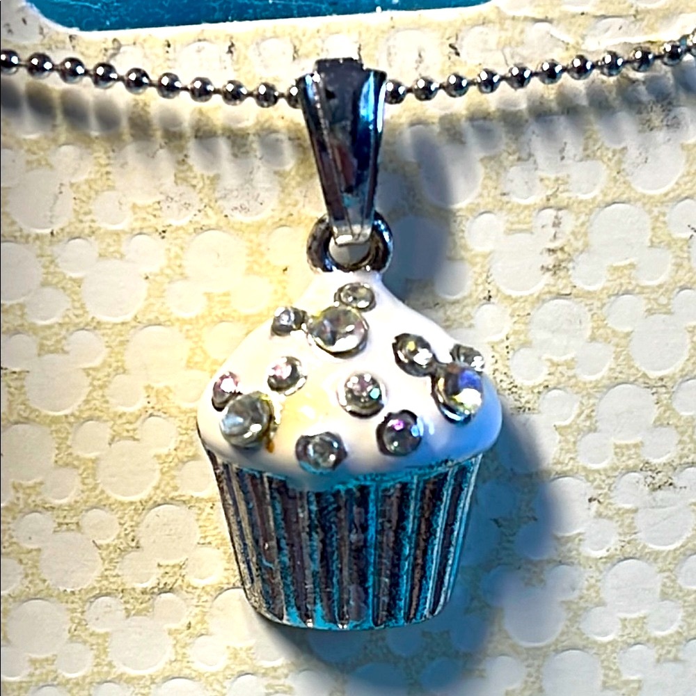 Disney Parks Merchandise Silver Tone and White Enamel Cupcake Pendant Necklace - Picture 2 of 4